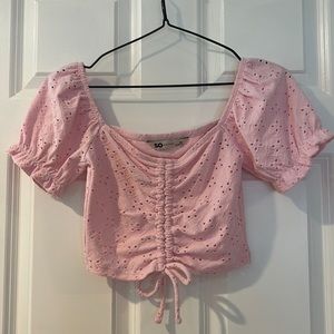 Pink tee shirt with ruffle sleeves